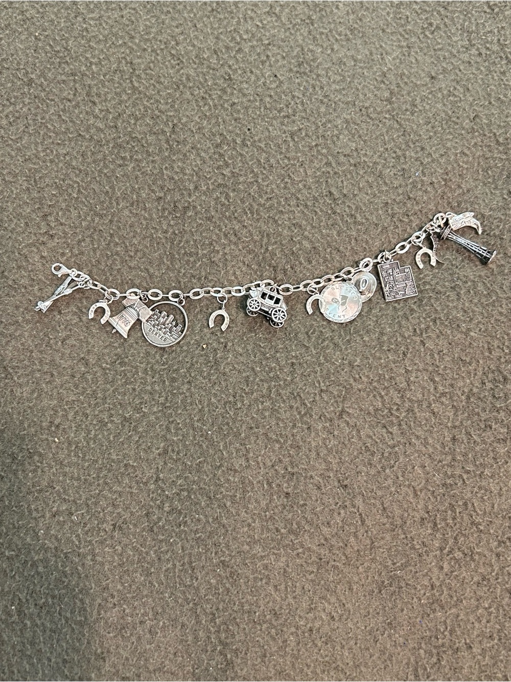Sterling Silver Charm Bracelet with 13  Charms.